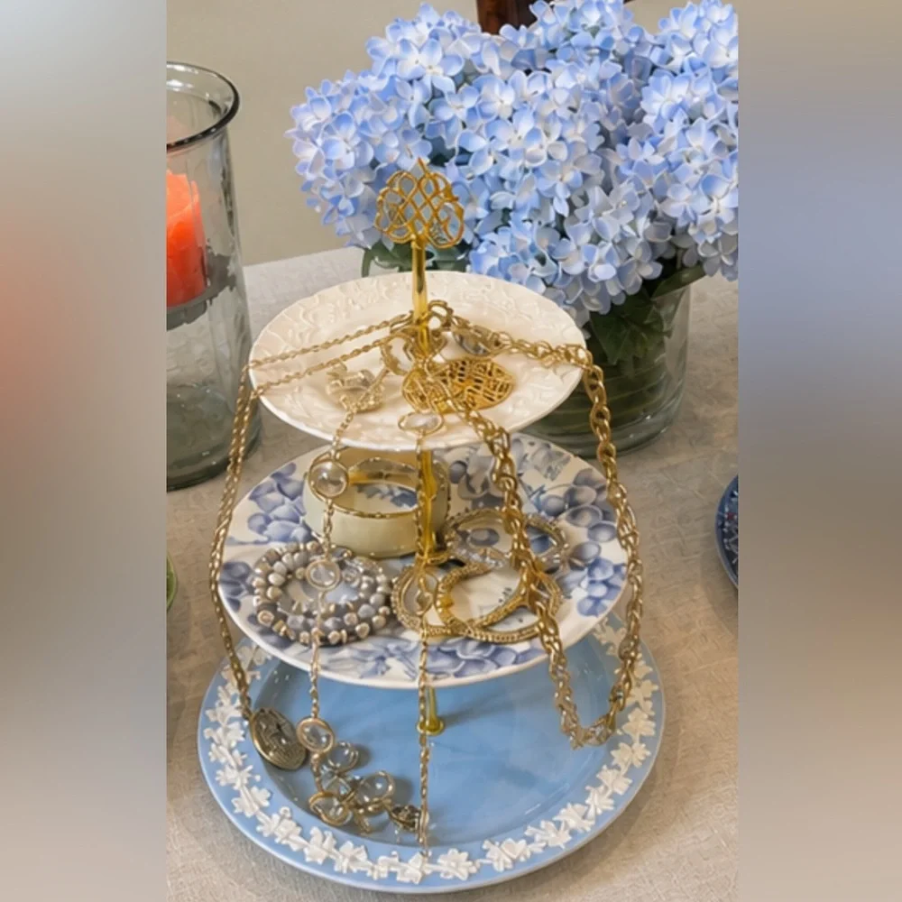 Handmade jewelry display or dessert display made out of vintage plates